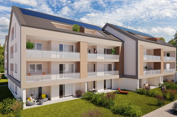 Moderne Wohnanlage mit drei Mehrfamilienhäusern Moderne Wohnanlage mit drei Mehrfamilienhäusern, Flachdach und Solarpaneelen, umgeben von Bäumen und Wegen und Balkonen.