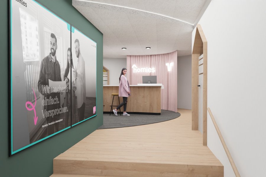 Flur mit grüner Werbewand und Durchblick auf Empfangsbereich mit Tresen und blauem Vorhang.